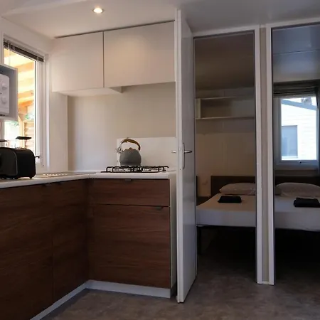 Happy Camp Mobile Homes In Village La Masseria Camping 4*